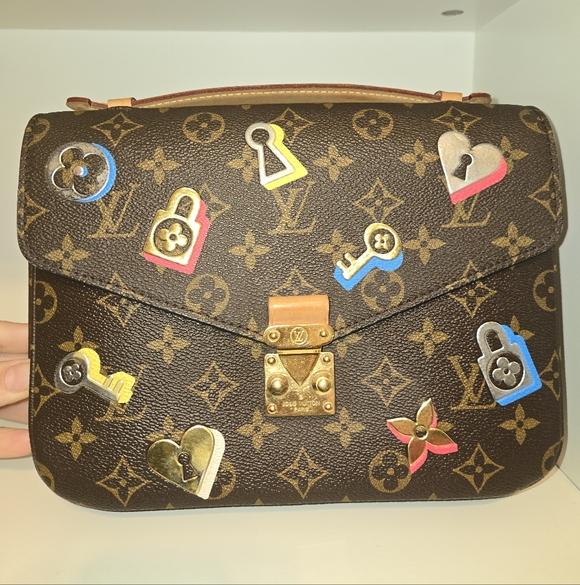 Louis Vuitton Handbags - Louis Vuitton Monogram Love Lock Pochette Metis